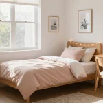 Stylish dorm room with bed, desk, storage solutions, and wall decor demonstrating space-saving decorating ideas for girls